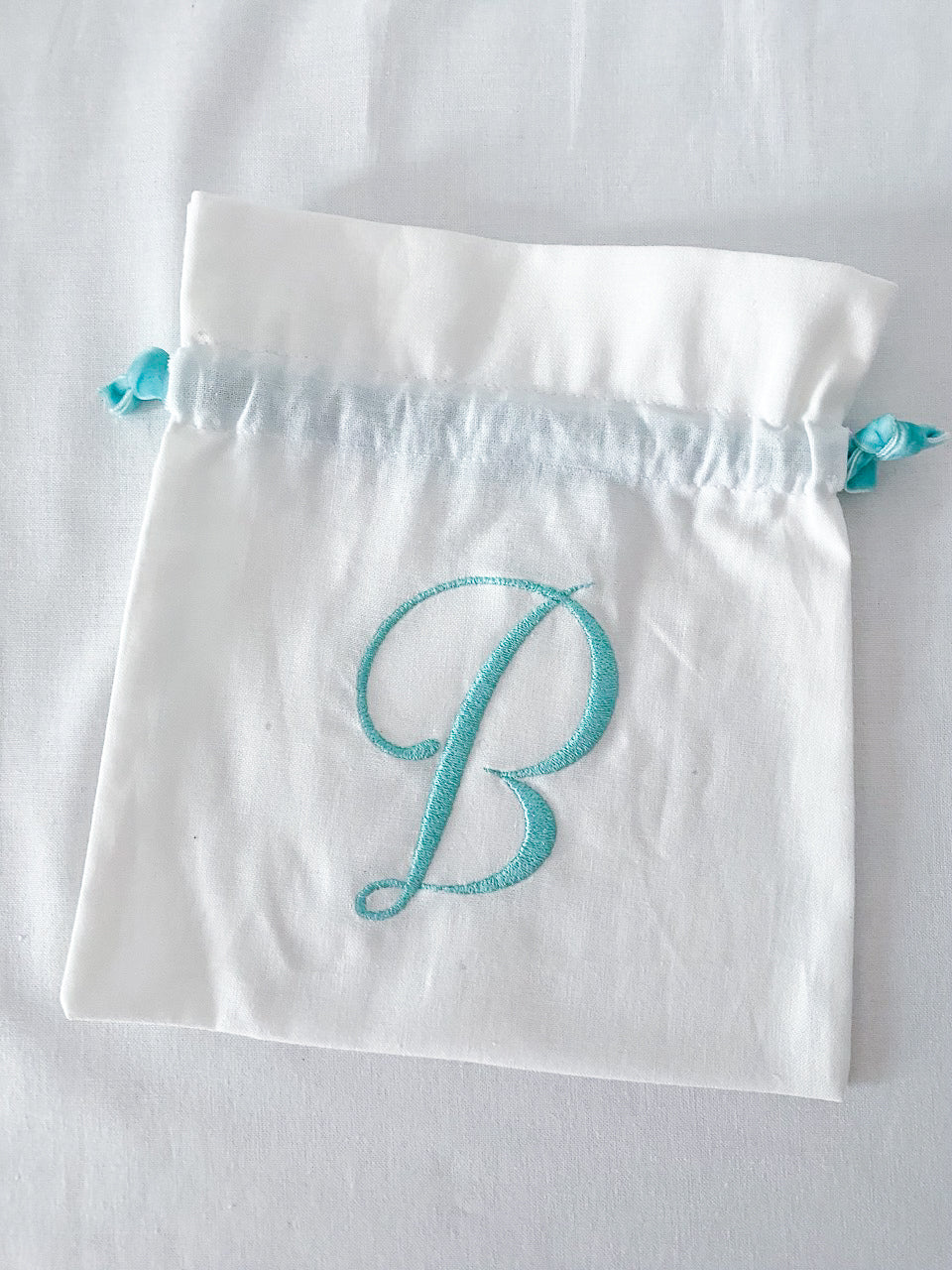 Saquito inicial B Azul Menta (Outlet)